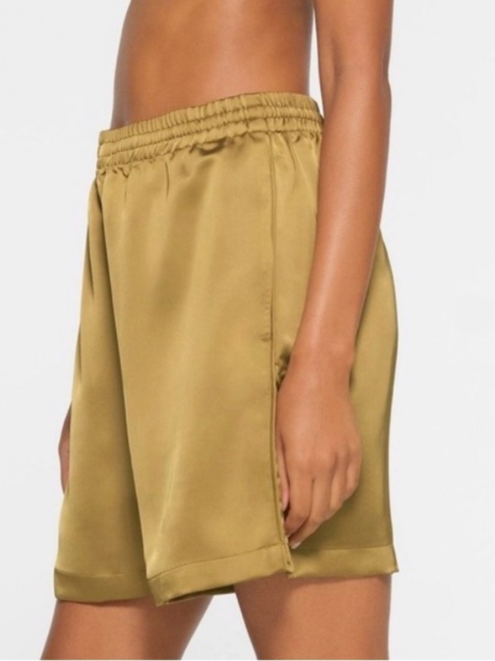 SKIMS Satin Athletic Shorts in Gold - Picture 2 of 6